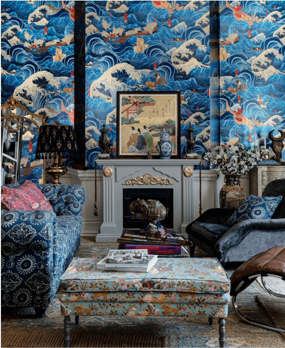 Maximalist room with blue wallpaper