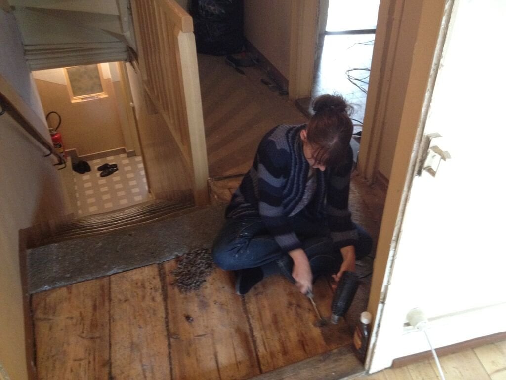 stripping floor boards in victorian house renovation