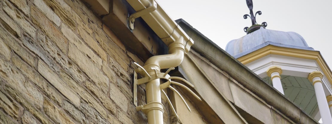 Cast iron guttering banner