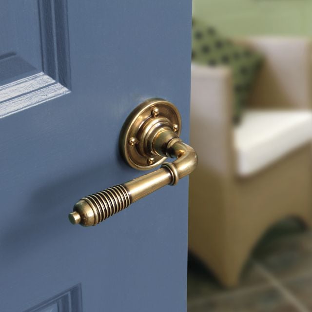 Reeded Lever Handle on Rose in Aged Brass | Handles