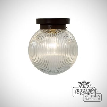 Reeded glass globe flush mount ceiling light with antique bronze metalwork