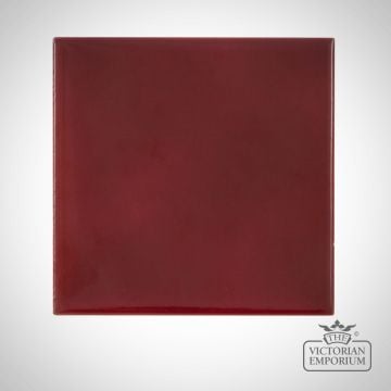 Deep red square fireplace tiles